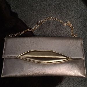 Brand new gold envelope purse with lips NWT